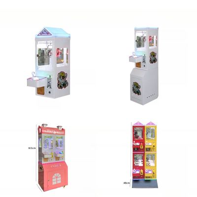 Buen precio Dreamland Moneda operada pequeña máquina de grúa de garra de juguete máquina de caramelos de garra barata Matel Mini en línea